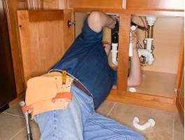 Plumber in Carlsbad CA replaces a sink drain